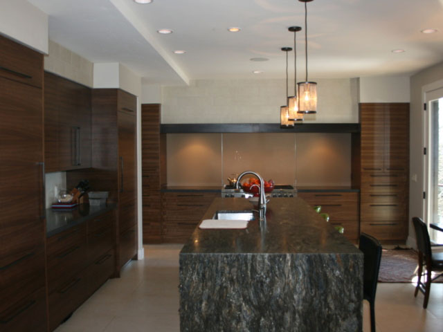 kitchen with waterfall countertop island