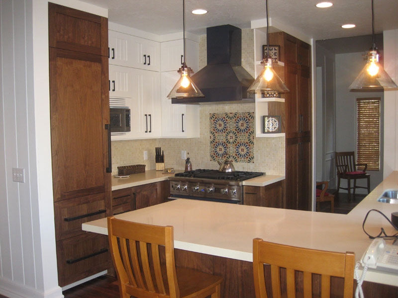 dual tone kitchen with mosaic tile