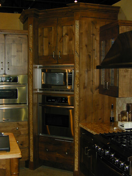 custom corner cabinetry with built in stove